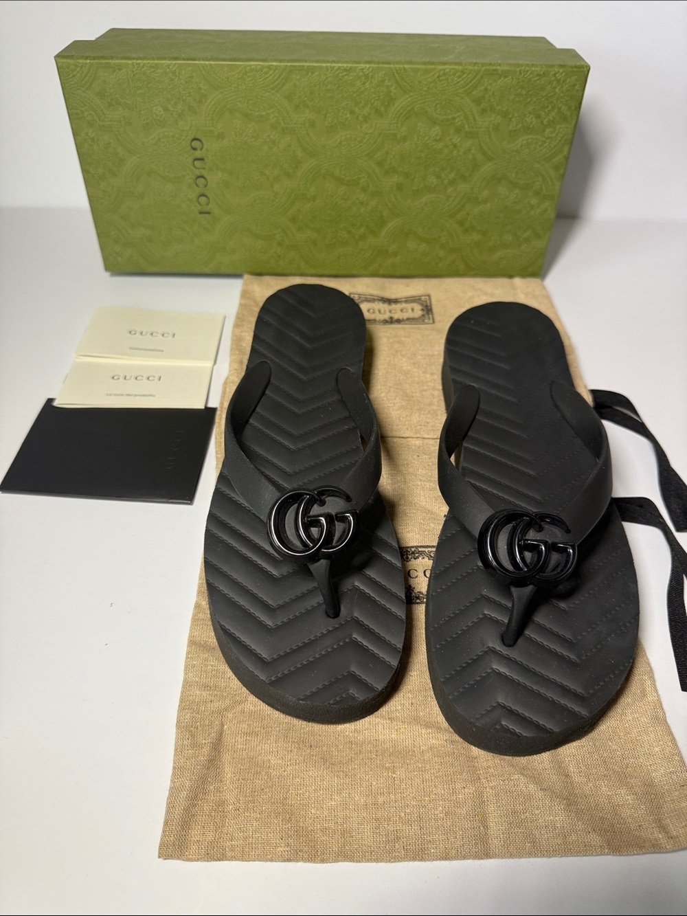 Gucci Black Rubber GG Logo Flip Flop Sandals